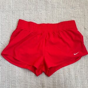 Nike Women’s Red Athletic Running Shorts with White Swoosh
